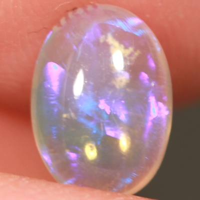 SOLID CRYSTAL OPAL Transparent with rich purple within